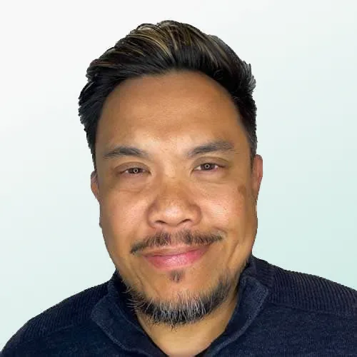 a headshot of Erwin Daria, Director of Technical Alliances, StormForge